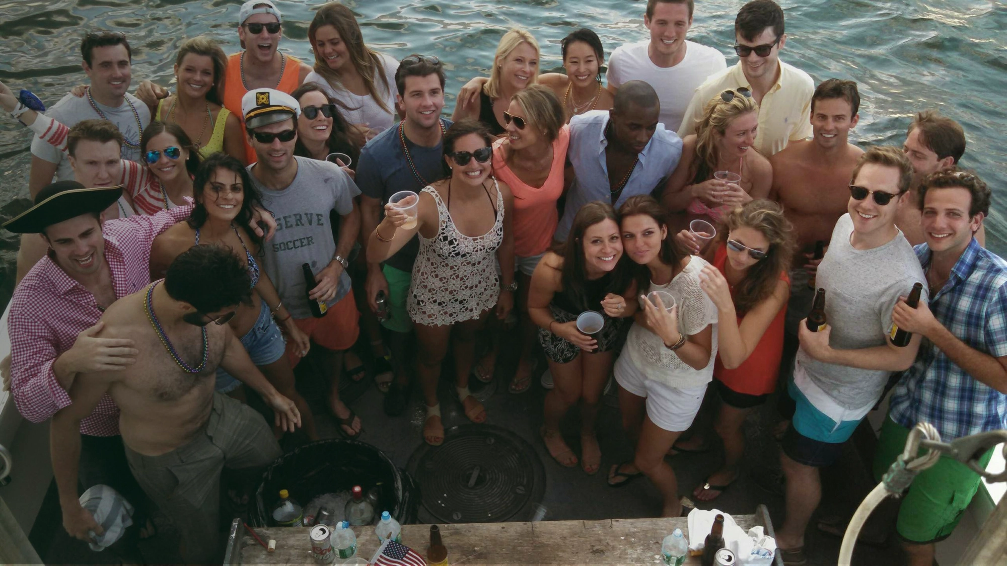 A group of people pose for a photo on the Susie E II boat.